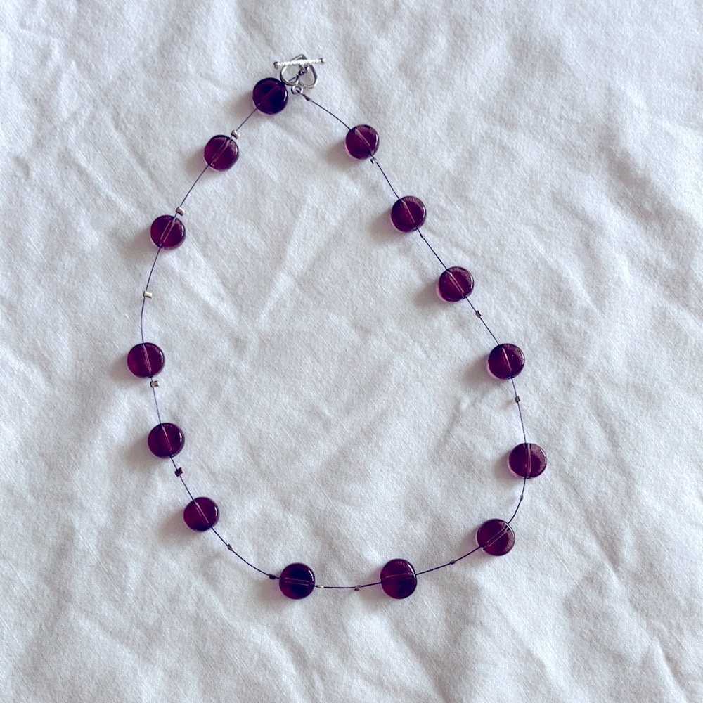 Necklace with purple beads